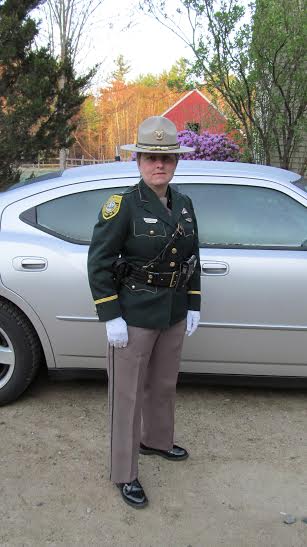 Carrie Nolet is pictured wearing her uniform before she retired from New Hampshire State Police.