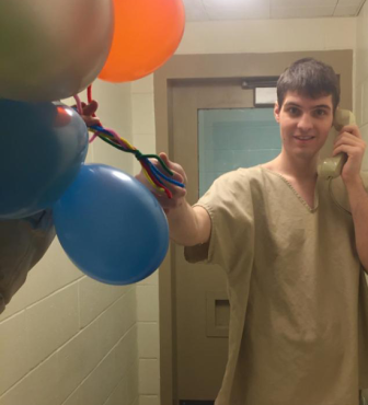 Corey Peterson is pictured on his 24th birthday at the Secure Psychiatric Unit at state prison. It's the photo that prompted the Department of Corrections to threaten his mother with arrest for taking it.