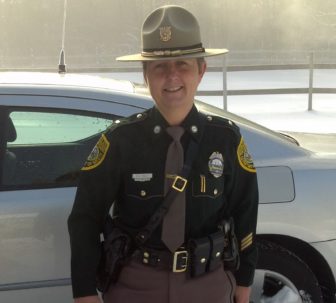 Carrie S. Nolet is pictured in uniform before she retired three years ago. 